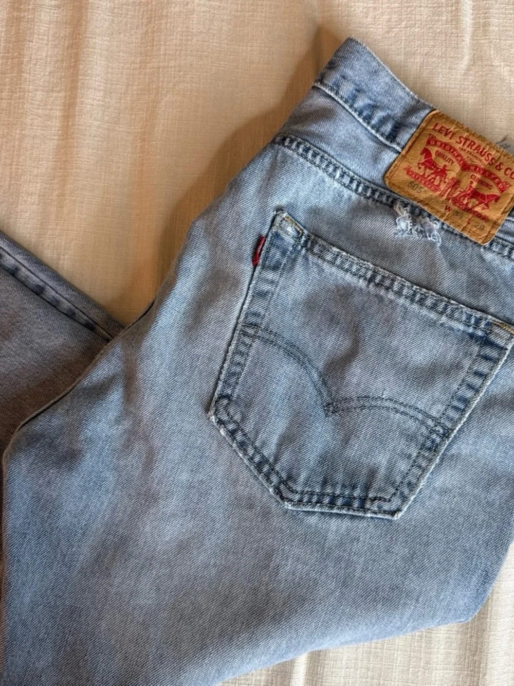Levi's Light Blue Men's Slim Straight Jeans with Classic Back Pocket